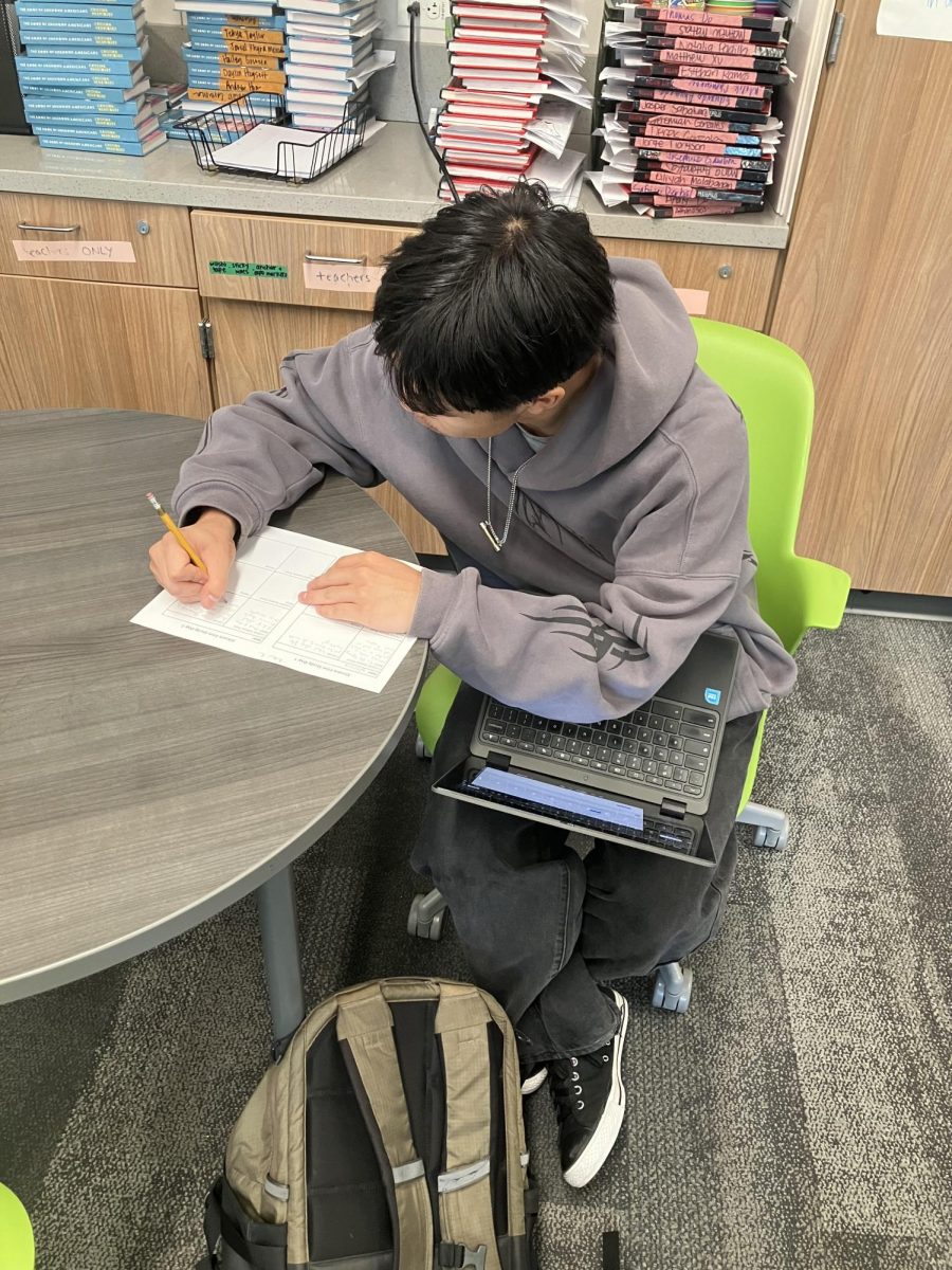 Hayden Honjo taking notes on the film “Sinners”